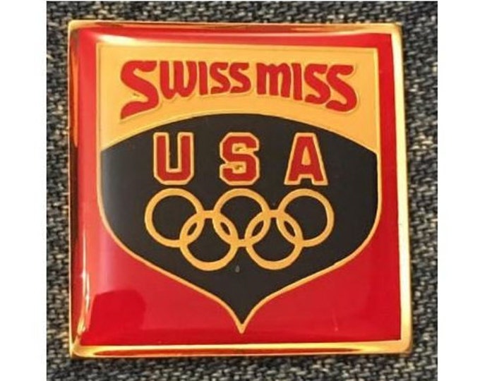 Olympic Pin ~ undated ~ 1988 Calgary & Seoul Games ~ USA Team Sponsor~Swiss Miss