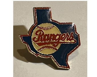 May include: A gold-colored pin shaped like the state of Texas with a baseball and the word "Rangers" in red lettering.