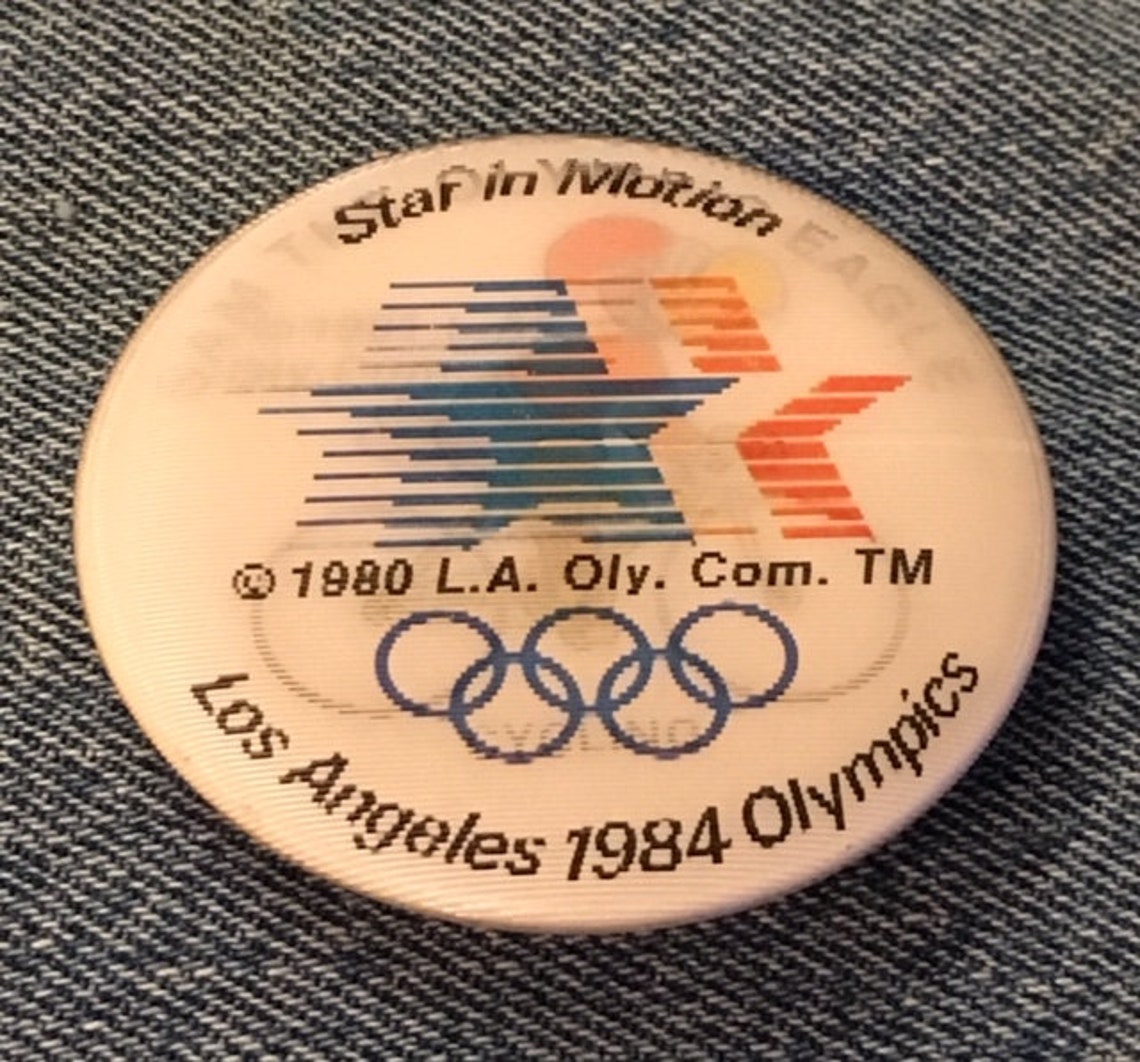 Pin's Mascotte Sam L'Aigle - Cyclisme - Jeux Olympiques Los Angeles 1984 - Neuf