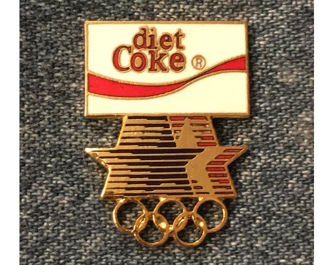 diet Coke Pin ~ 1984 Olympics at Los Angeles with Stars in Motion Logo and 5 Rings