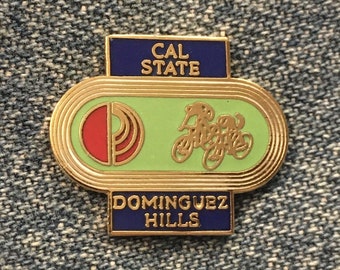 Cycling Olympic Commemorative Pin ~ 1984 Los Angeles ~ CAL STATE ~ Dominguez Hills ~ blue & green background