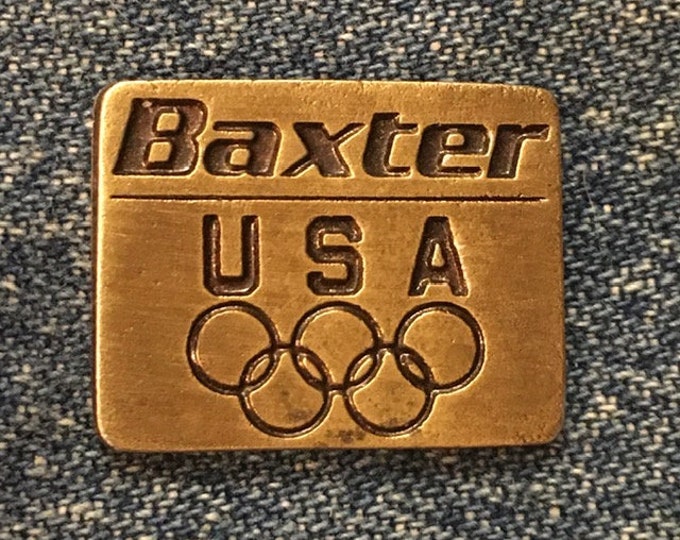 Olympic Pin ~ undated from 1992 Albertville & Barcelona Games ~ USA Team Sponsor ~ Baxter