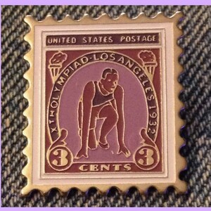 May include: A vintage 3-cent United States postage stamp depicting a runner in a red and white uniform. The stamp commemorates the 1932 Los Angeles Olympiad.