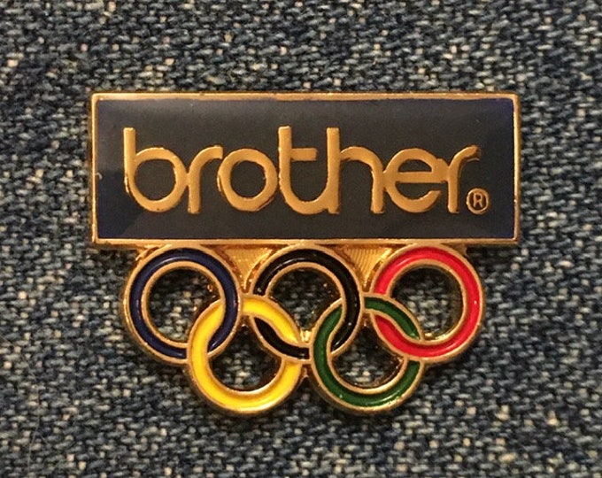 Olympic Pin ~ undated ~ 1988 Calgary & Seoul Games ~ USA Team Sponsor~Brother
