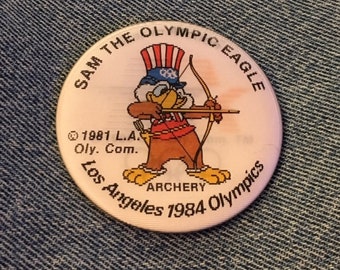 Archery Pinback Button Pin ~ Los Angeles 1984 Olympics ~ Holographic Hologram ~ Mascot Sam the Eagle
