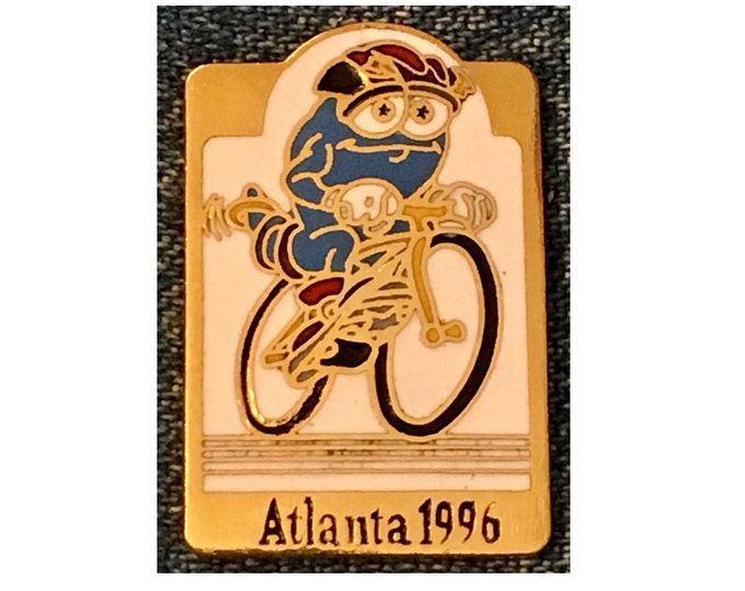 Mascot IZZY ~ 1996 Olympic Lapel Pin ~ Cycling ~ Summer Games ~ Cloisonne by HoHo NYC