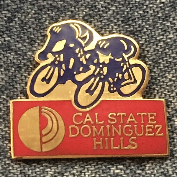 Cycling Olympic Commemorative Pin ~ 1984 Los Angeles ~ CAL STATE ~ Dominguez Hills ~ red background