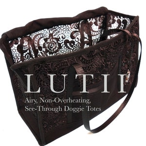May include: A brown canvas tote bag with a lace design. The bag has a black handle and the words "LUTII Airy, Non-Overheating, See-Through Doggie Totes" are printed on the front.
