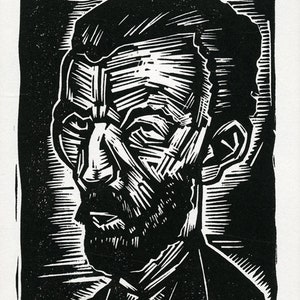 May include: Black and white woodcut print of Vincent van Gogh's portrait. The print is signed "Van Gogh" and "Sean Eaby".
