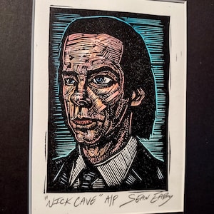 Nick Cave linocut portrait print with watercolor by Sean Eaby
