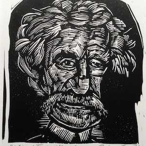 May include: Black and white woodcut print of Mark Twain, a famous American author. The print is signed "Mark Twain" and "Sean Cagg" in the bottom right corner.