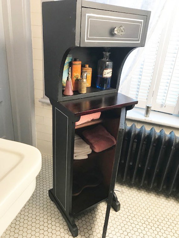 vintage barber shop cabinet