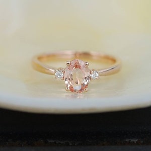 Peach sapphire engagement ring. Promise ring. Oval engagement ring. 3 stone ring. Rose gold engagement ring. Gemstone ring by Eidelprecious