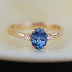 Blue sapphire engagement ring. Promise ring. Oval engagement ring. 3 stone ring. Rose gold engagement ring. Gemstone ring by Eidelprecious