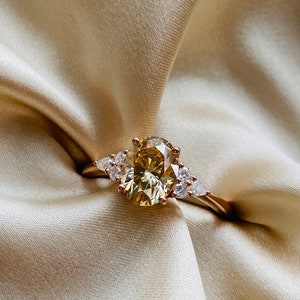 Champagne engagement ring. Moissanite Promise ring. Oval moissanite engagement ring. 7 stone ring. Rose gold engagement ring Eidelprecious