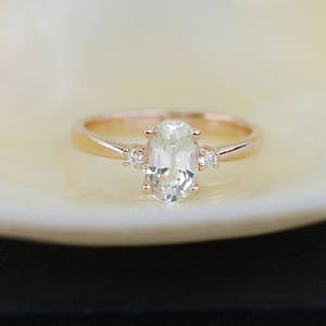 White sapphire engagement ring. Promise ring. Oval engagement ring. 3 stone ring. Rose gold engagement ring. Gemstone ring by Eidelprecious