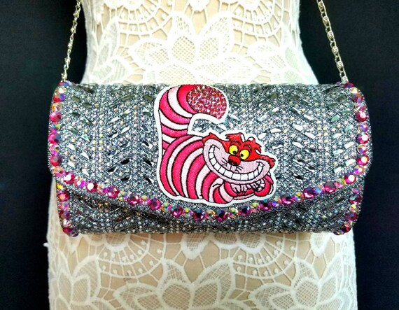 cheshire cat purse