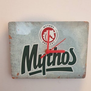 Mythos metal wall clock