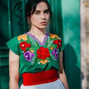 Stand Out with these Beautiful V neck Tops embroidered with a floral design traditionally made in Mexico, a MUST-have Mexican Top