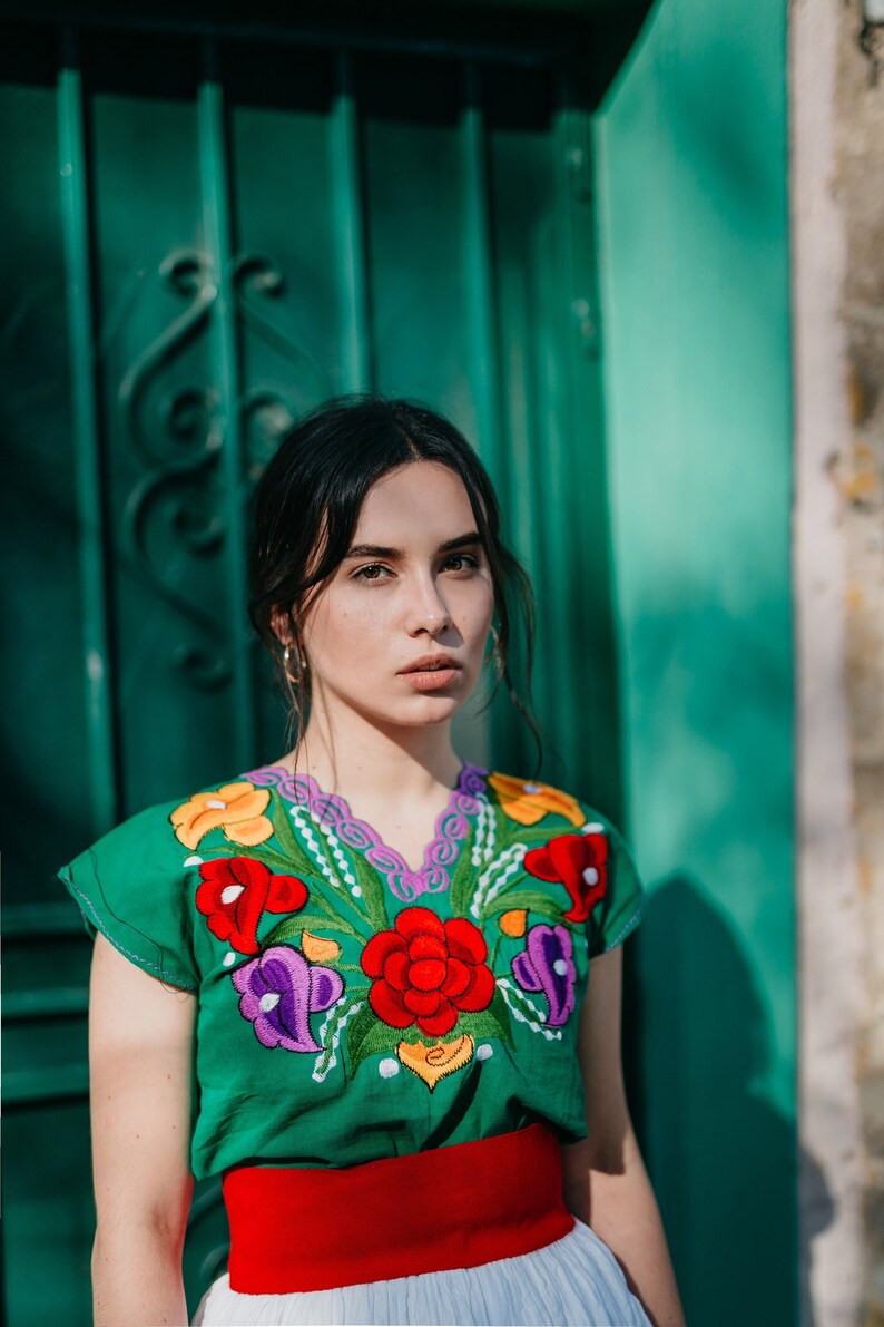 Stand Out with these Beautiful V neck Tops embroidered with a floral design traditionally made in Mexico, a MUST-have Mexican Top