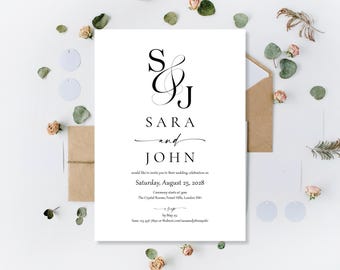 May include: A white wedding invitation with black calligraphy. The invitation reads "Sara and John" and includes the wedding date, time, and location. The invitation is surrounded by dried flowers and greenery.