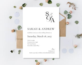 May include: A white wedding invitation with black text, featuring the names "SARAH & ANDREW" and event details. The invitation includes the date, time, and location. The design incorporates a monogram and is surrounded by decorative elements.
