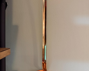 Copper ladle with brass handle