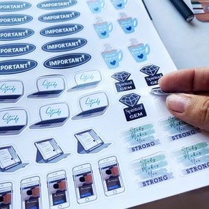 May include: A sheet of stickers with various designs, including blue coffee mugs, laptops with the word "Study", and the text "Important!". The stickers also feature the words "Spiritual GEM" and "Study Makes You Strong".