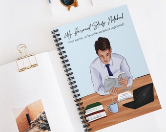 May include: Spiral-bound notebook with a light blue cover featuring the text "My Personal Study Notebook." The cover illustration depicts a person reading. Additional text reads "Your name, or favorite scripture (optional)." A stack of books, a laptop, and a coffee cup are also visible.