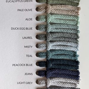 May include: A color swatch card featuring thirteen braided cord samples in various shades including Pine Green, Avocado, Eucalyptus Green, Pale Olive, Aloe, Duck Egg Blue, Laurel, Misty, Teal, Peacock Blue, Jeans, Light Grey, Steel, Charcoal, and Black.