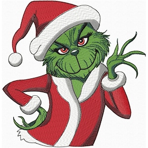 Op de afbeelding: Geborduurd beeld van een groene creatuur in een rood kerstmanpak en -muts met witte rand. Het personage heeft een ondeugende grijns en rode ogen, met één hand omhoog. Het ontwerp is een feestelijk vakantiethema.