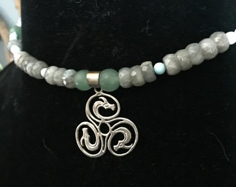 Land, Sea, and Sky: Celtic Dragon Triskele Necklace