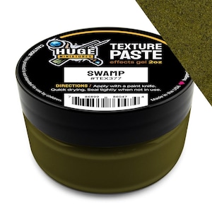 May include: A round container of Huge Miniatures Swamp texture paste, an olive green effects gel. The black lid features white text including the product name, 2oz volume, and directions for use with a paint knife, plus a barcode.