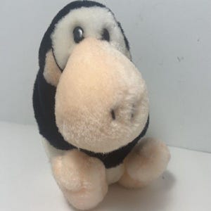 Dakin Opus 6 inch Penguin Sitting with Plaid Tie Vintage 1982 No hang tag