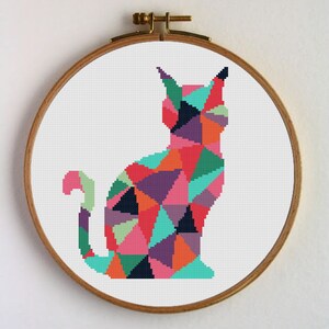 Cat silhouette cross-stitch pattern geometric cat silhouette. Modern geometric pattern. Pattern Geometric animal silhouette.
