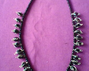 Series 7 N Lola cage necklace