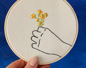 Embroidery art - hand holding a bouqet of buttercups - 5 inch hoop