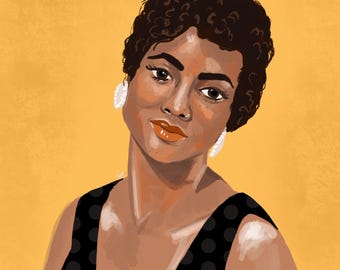 May include: A portrait of a woman with short, curly brown hair. She is wearing a black and white polka dot dress and has a warm, friendly expression.