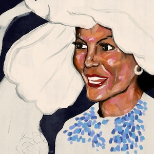 May include: A woman with dark skin is wearing a white hat with a large brim and a white dress with a blue and white patterned neckline. She is smiling and looking to the right.