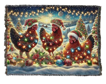 May include: A rectangular woven throw blanket featuring three brown chickens wearing red and green Santa hats. The chickens are wrapped in colorful glowing Christmas lights. The background shows a snowy landscape with decorated pine trees.