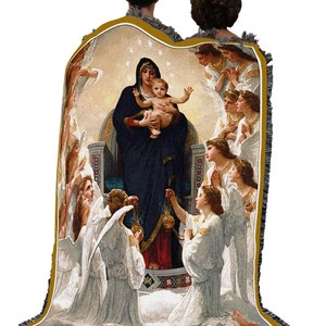 May include: A tapestry throw blanket featuring a depiction of the Virgin Mary and baby Jesus surrounded by angels. The tapestry is woven with intricate details and vibrant colors, including gold, blue, and white.