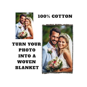 May include: A woven throw blanket featuring a personalized photo of a couple in a wedding setting. The blanket is made of 100% cotton and has a fringed edge.