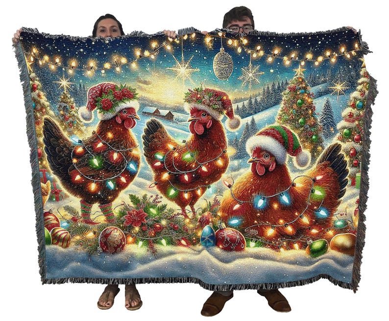 May include: A woven throw blanket featuring three brown chickens wearing Santa hats and wrapped in colorful Christmas lights. The scene includes decorated pine trees, snow-covered ground, hanging string lights, and ornaments against a winter landscape.