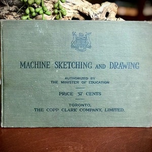 May include: A green book titled "Machine Sketching and Drawing" with the text "Authorized by the Minister of Education" and "Price 37 Cents". The book also includes the text "Toronto, The Copp Clark Company, Limited."