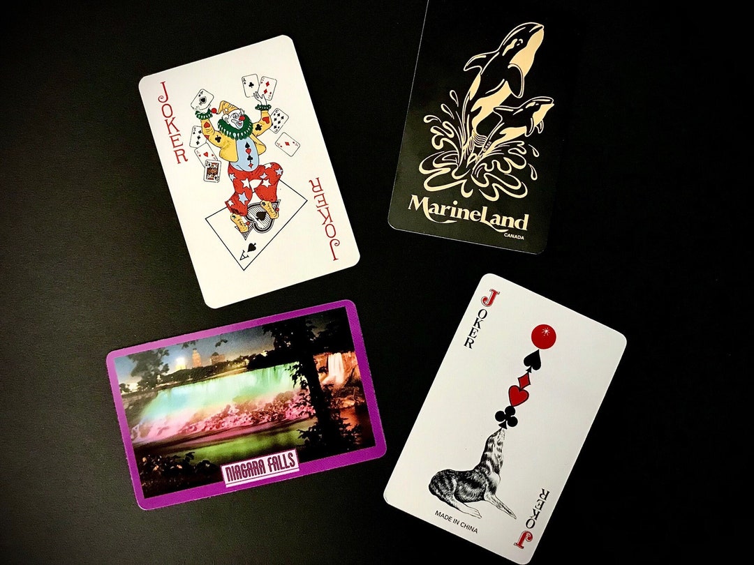 Lot of 4 Joker Card Cards Jokers Marineland Canada Black Gold hq photo