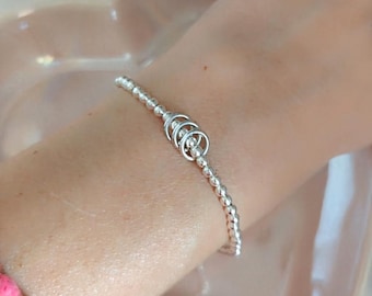Milestone Birthday Bracelet: Silver Plated Rings for Each Decade