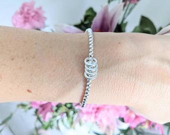 Milestone Birthday Bracelet: Silver Plated Rings for Each Decade