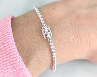 Milestone Birthday Bracelet: Sterling Silver Rings for Each Decade