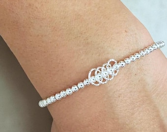 Milestone Birthday Bracelet: Sterling Silver Rings for Each Decade