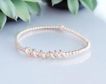 Sterling Silver Milestone Birthday Bracelet: Hammered Rings for Each Decade